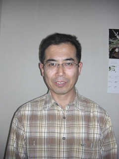 田中会長_顔写真.jpg
